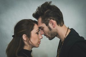 Couple with heads together