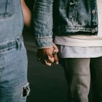 Couple holding hands